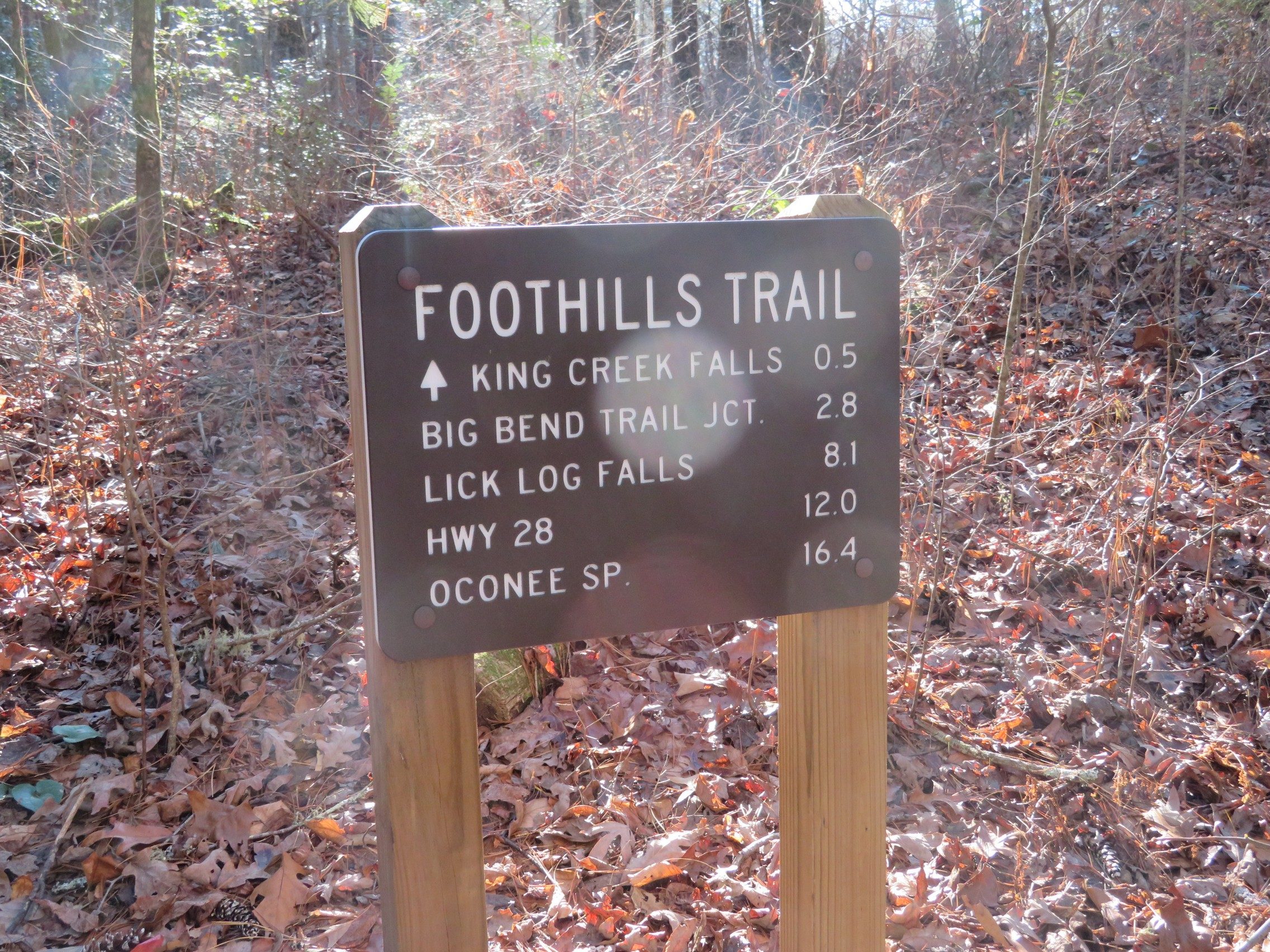 Trailhead sign near the parking lot