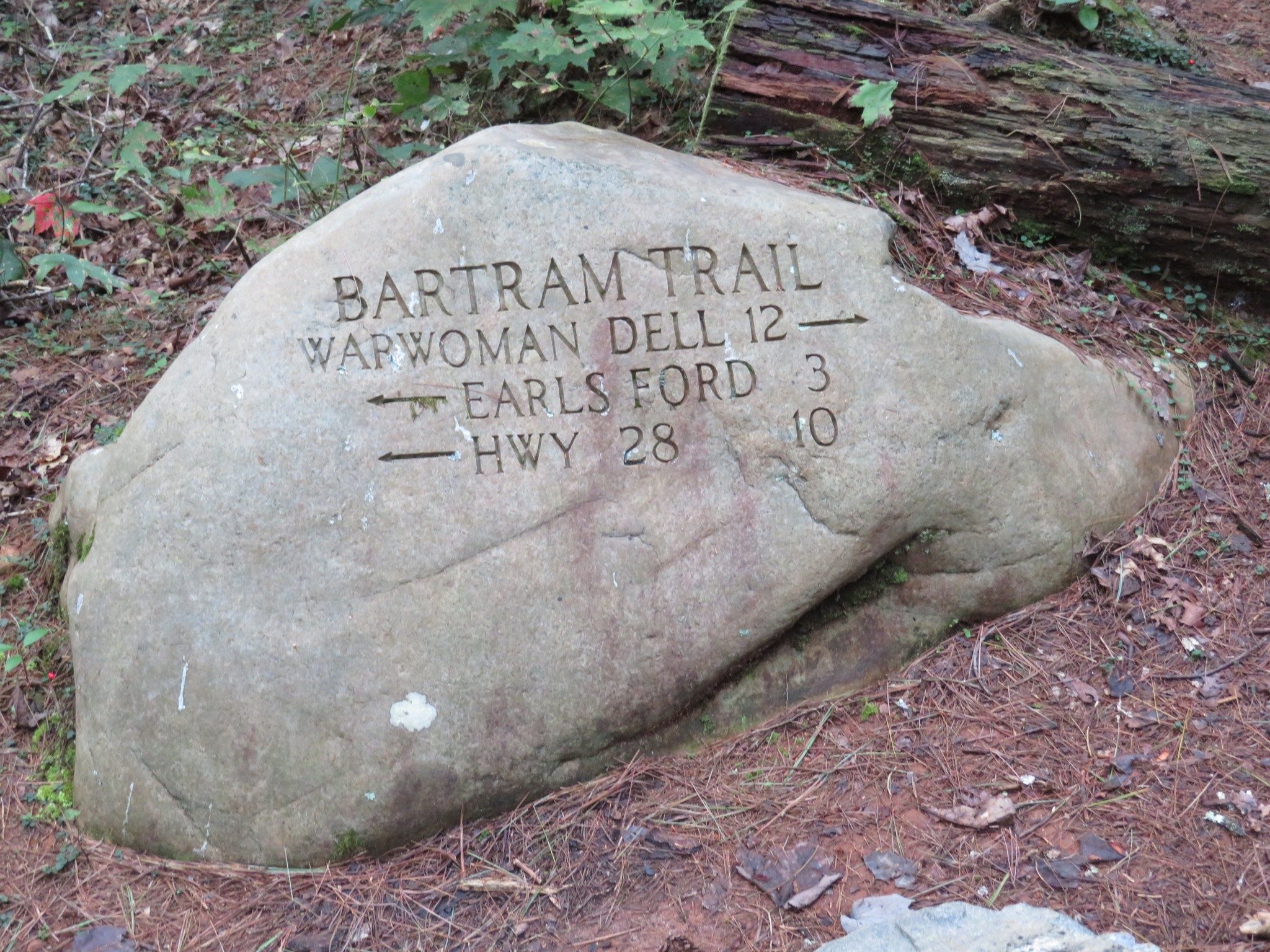 Engraved stone marker where Bartram Trail crossed Sandy Ford Rd