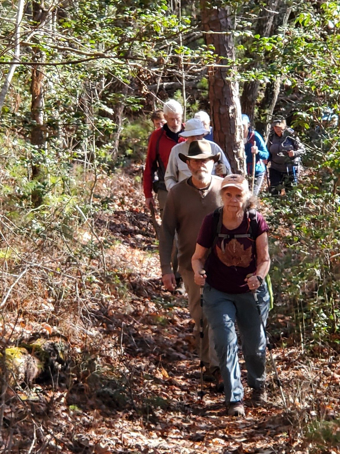 Headed up the first short hill after the water crossing.  Carole looks pretty determined on this hike.