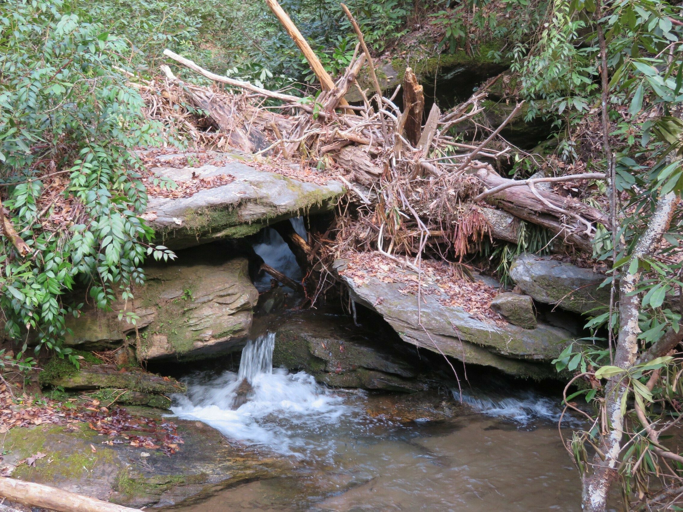 Scenic waterflow at third bridge crossing.