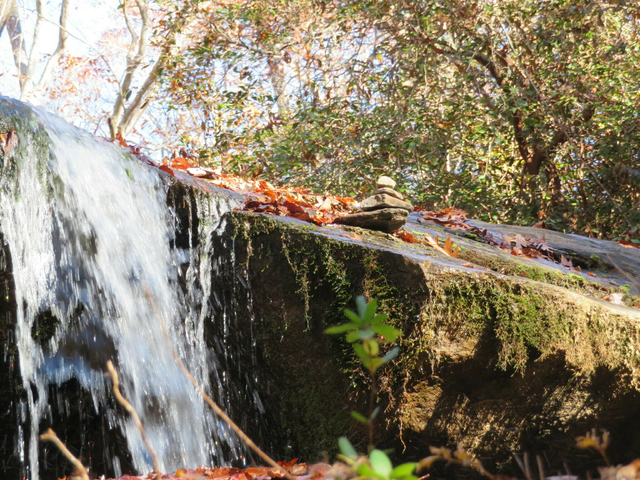 Check out this rock cairn on the top of the falls that someone took quite the effort to build.