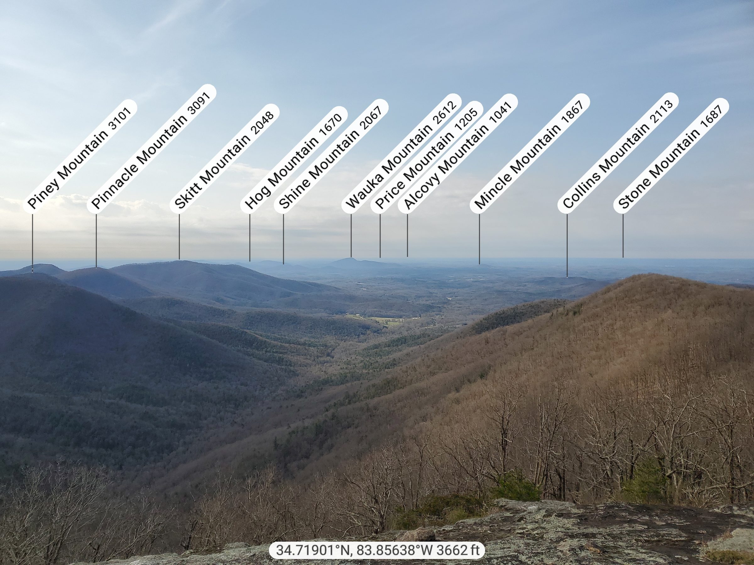 A view from Cow Rock using the Peak-Finder app that identifies peaks. . . even Stone Mountain in the distance.