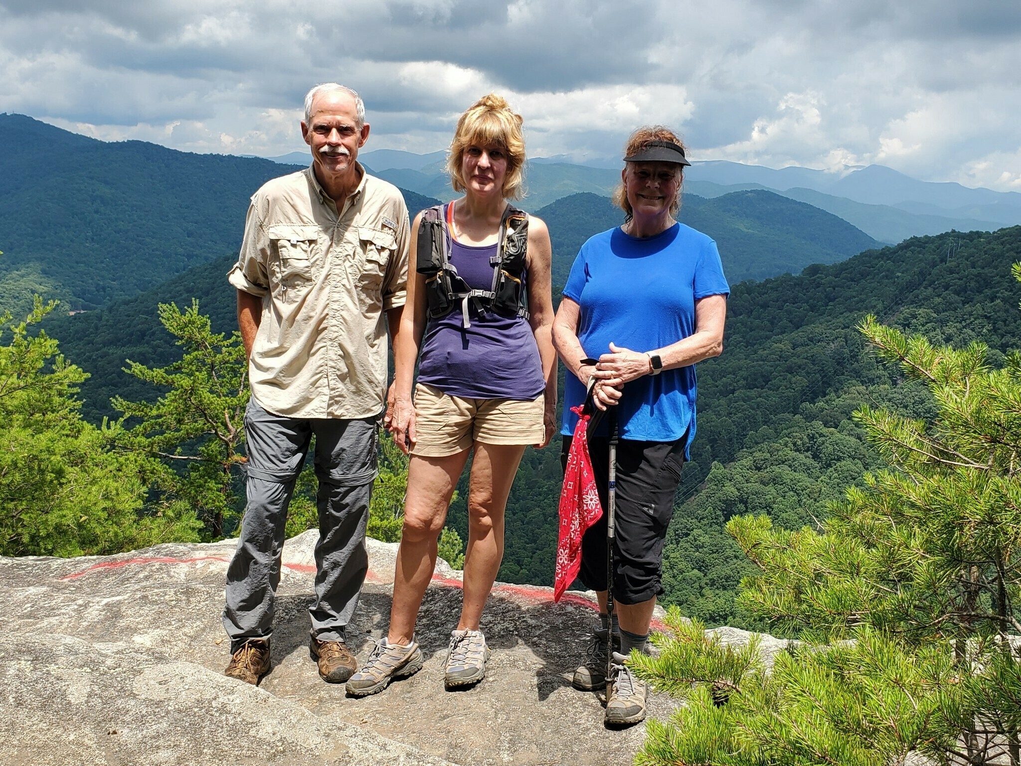 Were here, Mike, Inna & Renee.  Agreed, we do look a bit hot and tired after that climb!