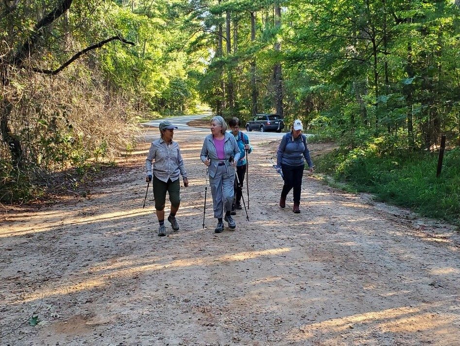 Some of our ladies catching up while getting started on the East Dam Road.