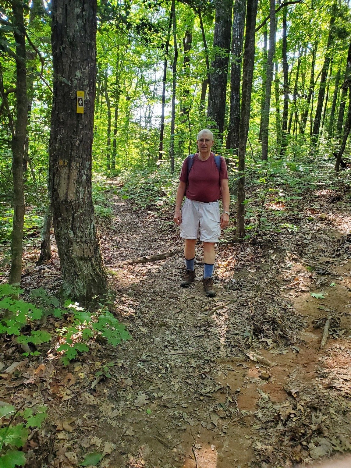 Ray coming off the unmarked trail from Rainy Mountain.