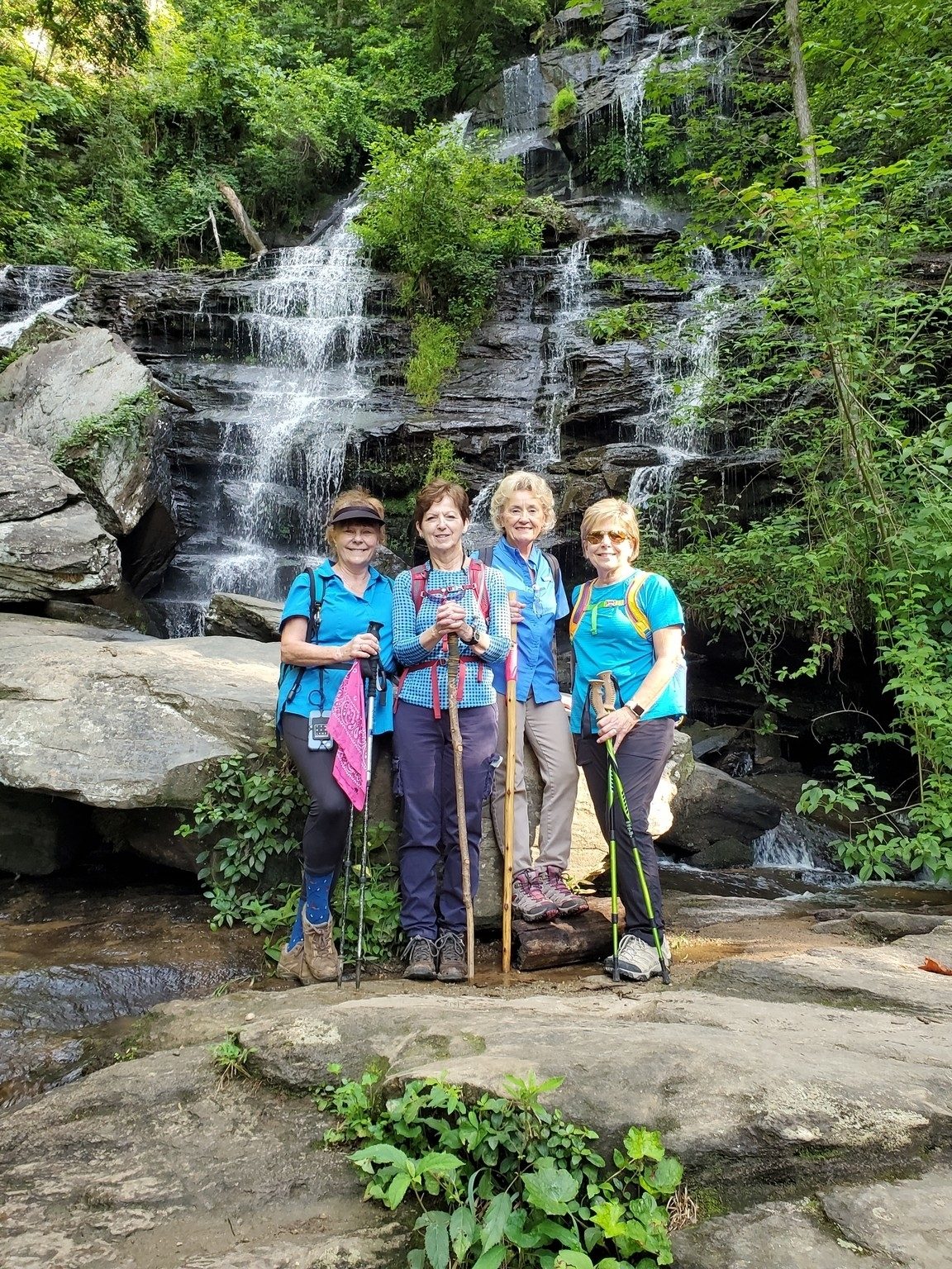 If not wet, it's best to scramble down to the base of the falls as our ladies did.