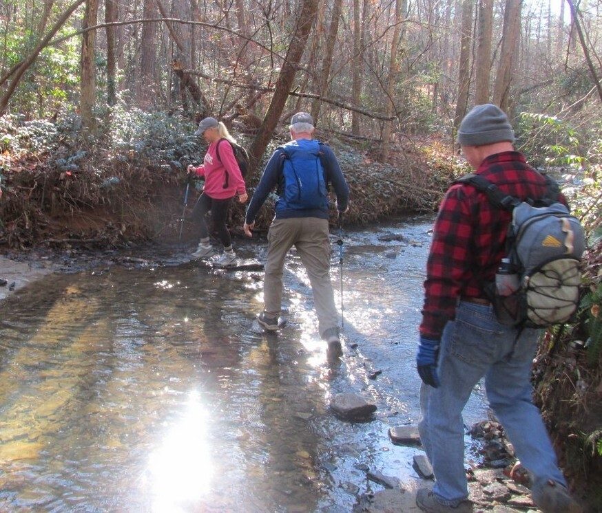 Sandy, Ken and Larry doing a bit of rock hopping to get across the creek near Rest Stop Falls.  These looked like the stepping stones we placed there last year.