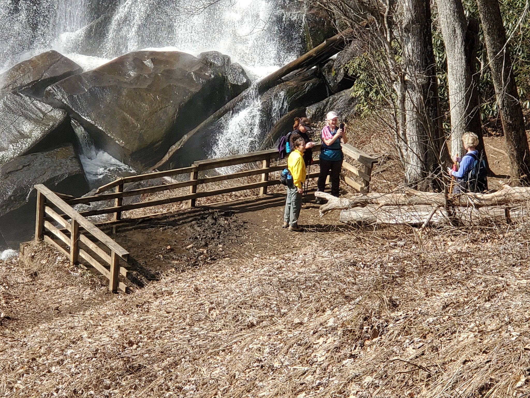 Some of our lady hikers taking pictures at the overlook at the base of Rainbow Falls.