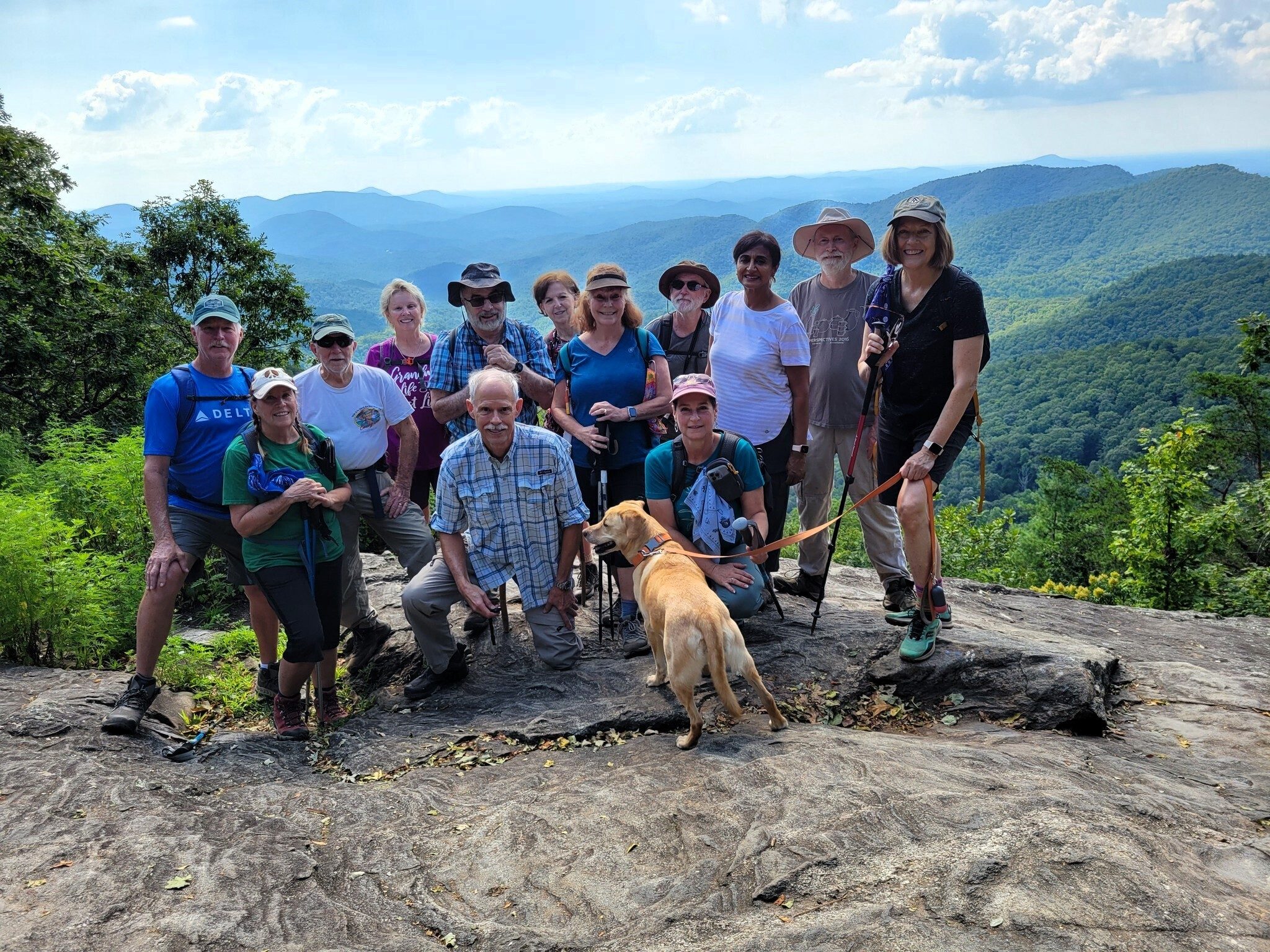 Today's hikers on Preacher's Rock (L-R): Back: Ken, Vic, Sue, Gary, Jenny, Renee, Rich, Gita, Matt & Jane; Front: Lynn, Mike, Squirt & Shelia.