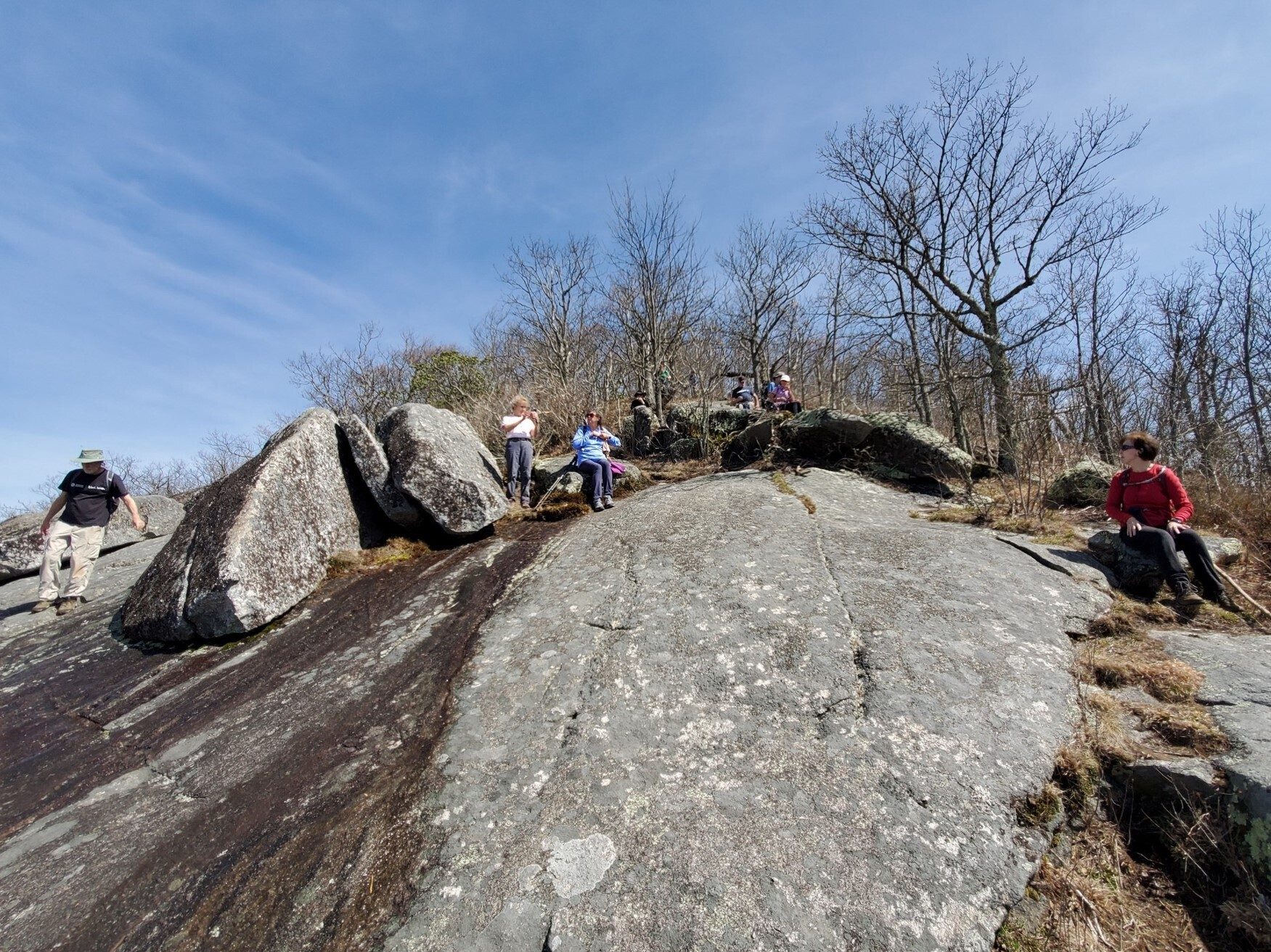 Others enjoying the view  but a bit further from the ledge.