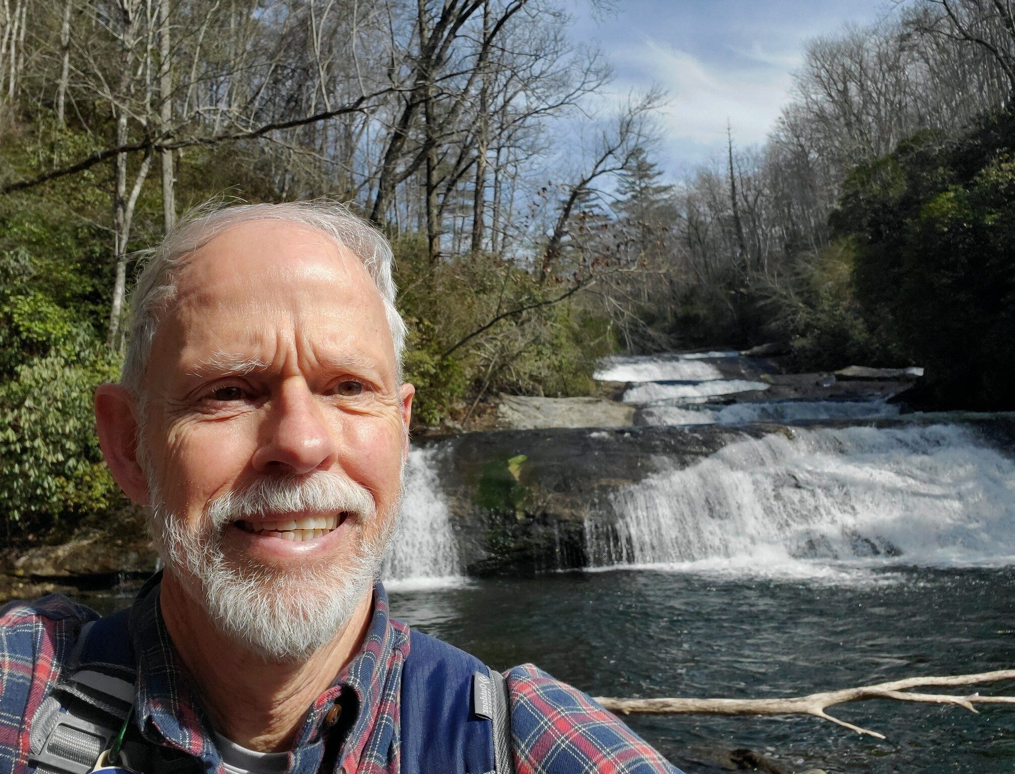 Another view of the several cascades composing Staircase Falls. Who's that old guy?