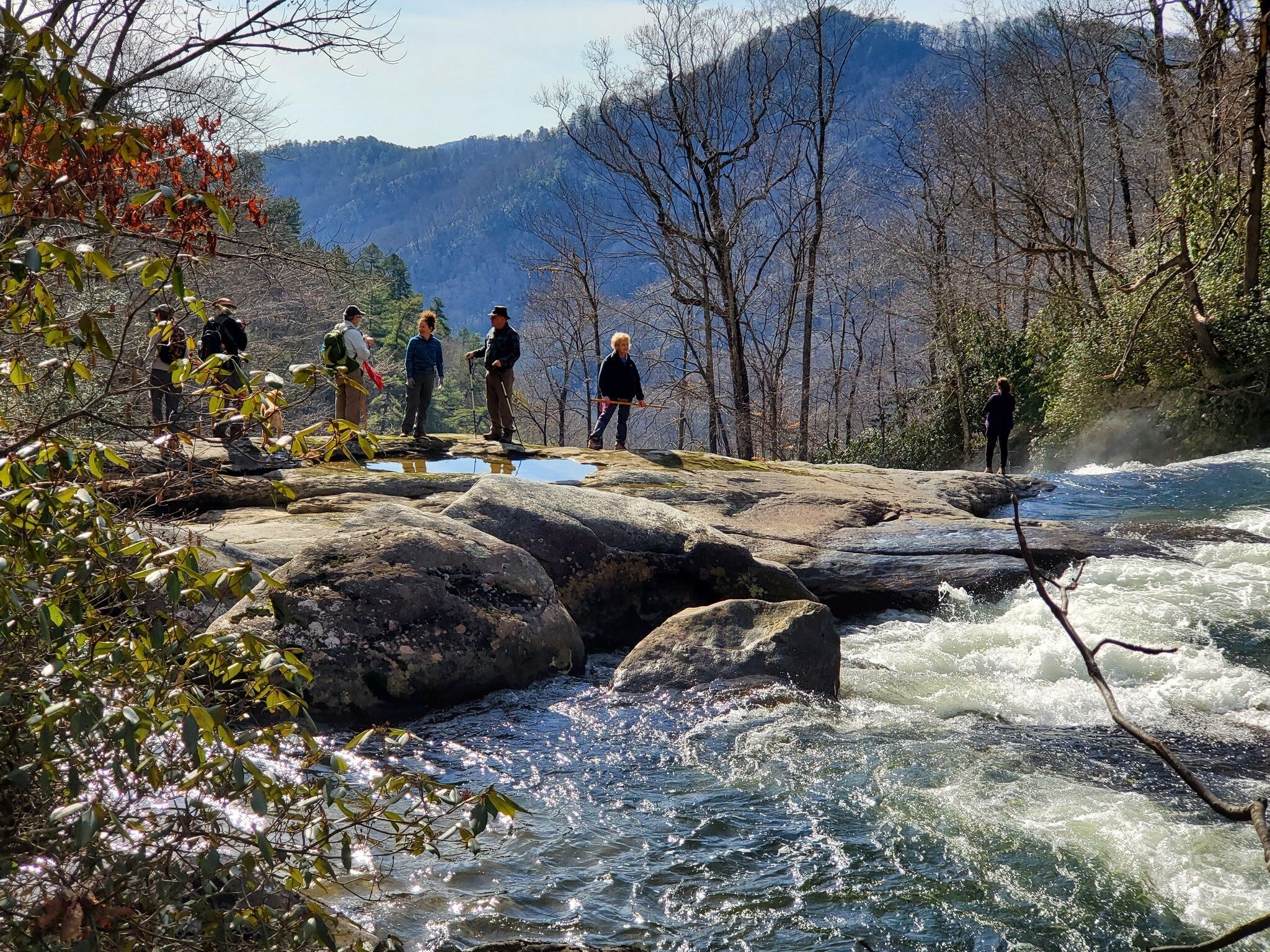 Several of our hikers on the top of Windy Falls.  You cannot see the bottom of the falls from here.