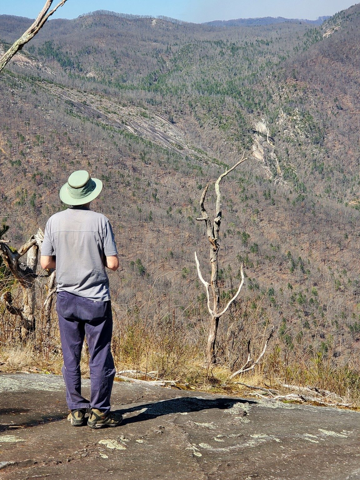 Matt contemplating the waterfall across the valley and smoke covering much of the terrain to the southeast.