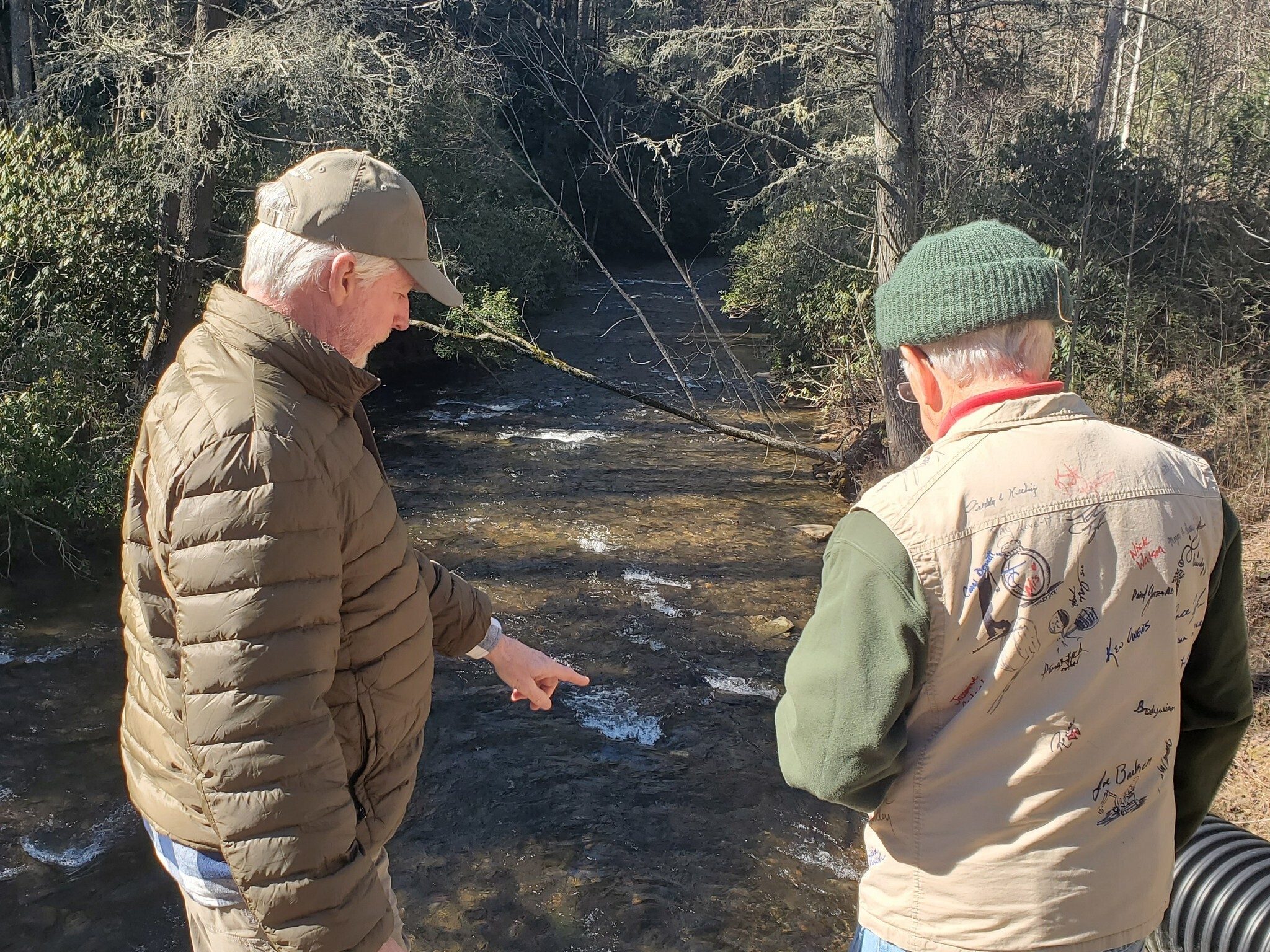Ken discussing the finer points of trout fishing with Joe.
