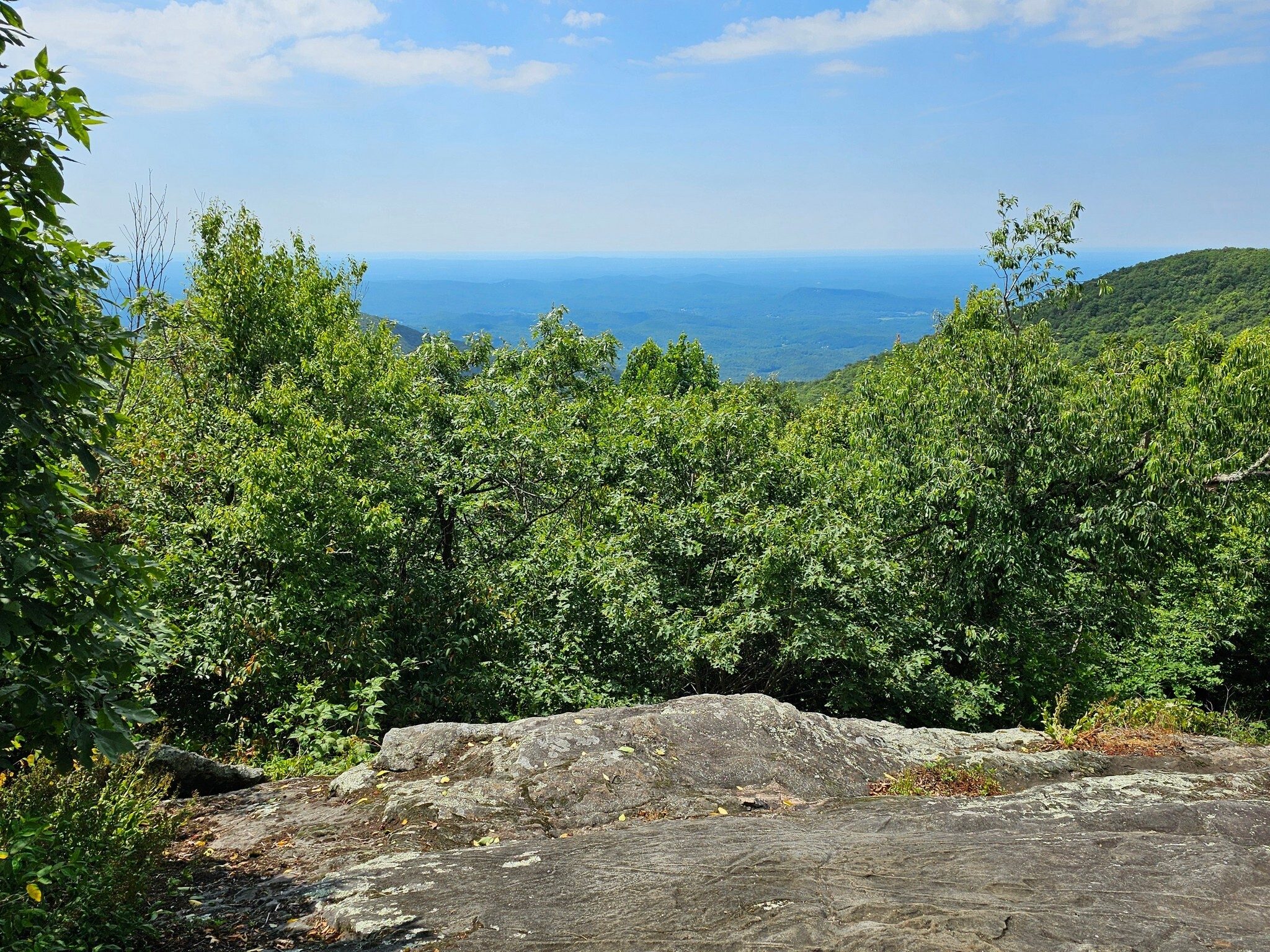 The fourth overlook at the Tray Mountain Shelter, is not quite, "just down the trail," but worth the extra 0.4-mile hike. Nice large outcrop, too.
