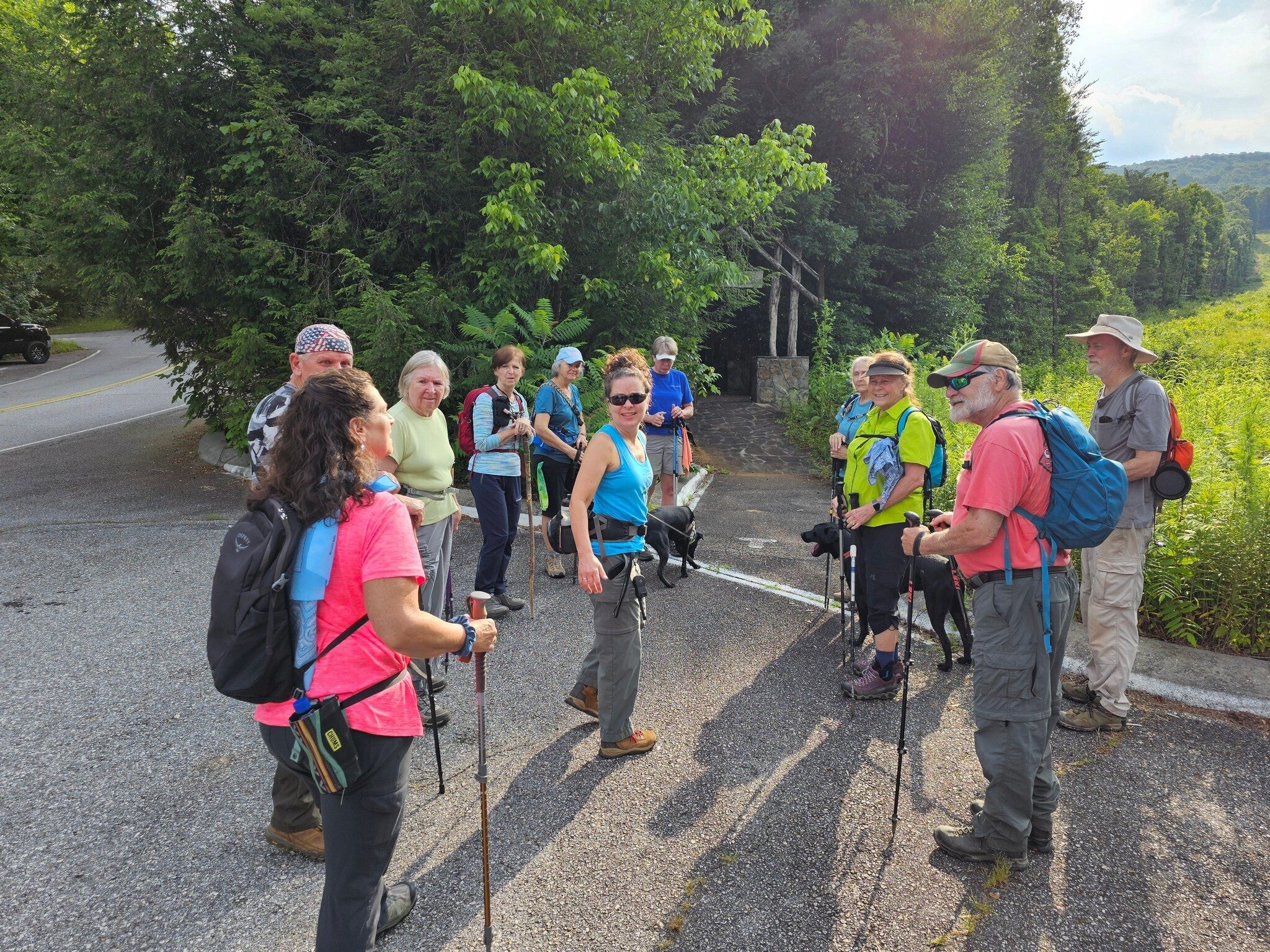 Looks like Shelia has everyone's attention at the trailhead.