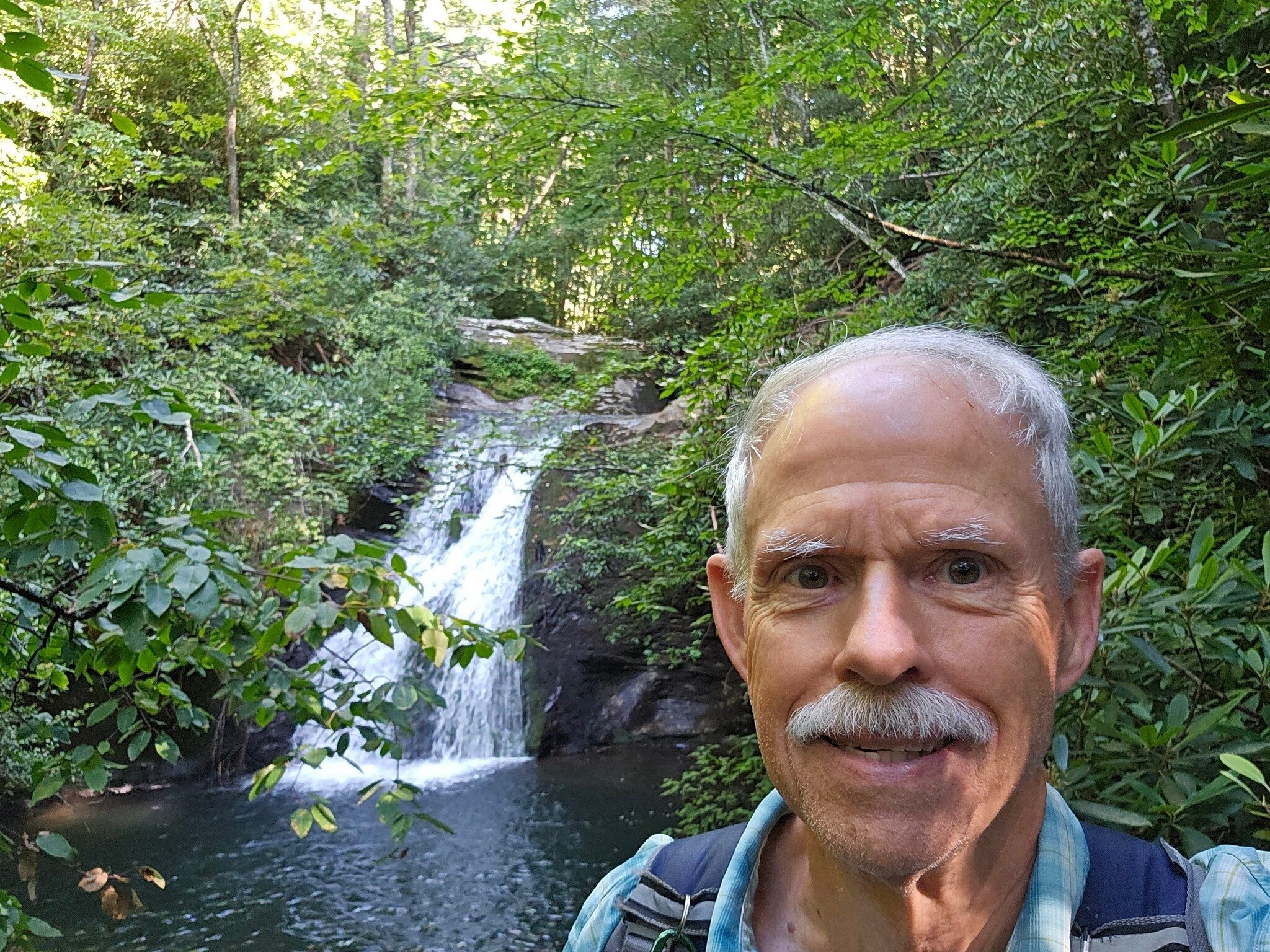 Blue Hole Falls with a headlight in the eyes look.
