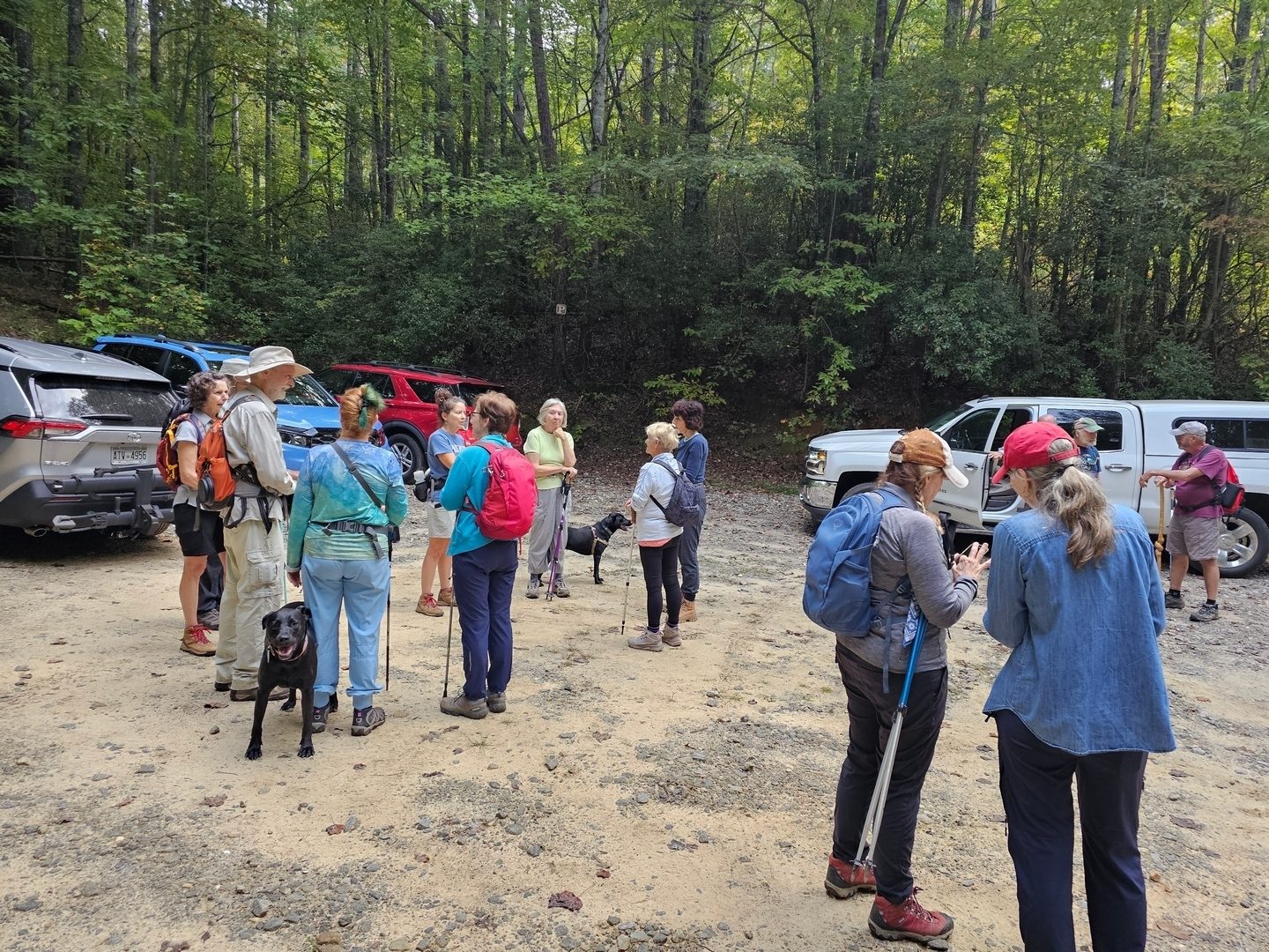 A pre-hike chat session, but it looks like the two-Tobys (trail-dogs) are more anxious to get started than our 15 hikers.