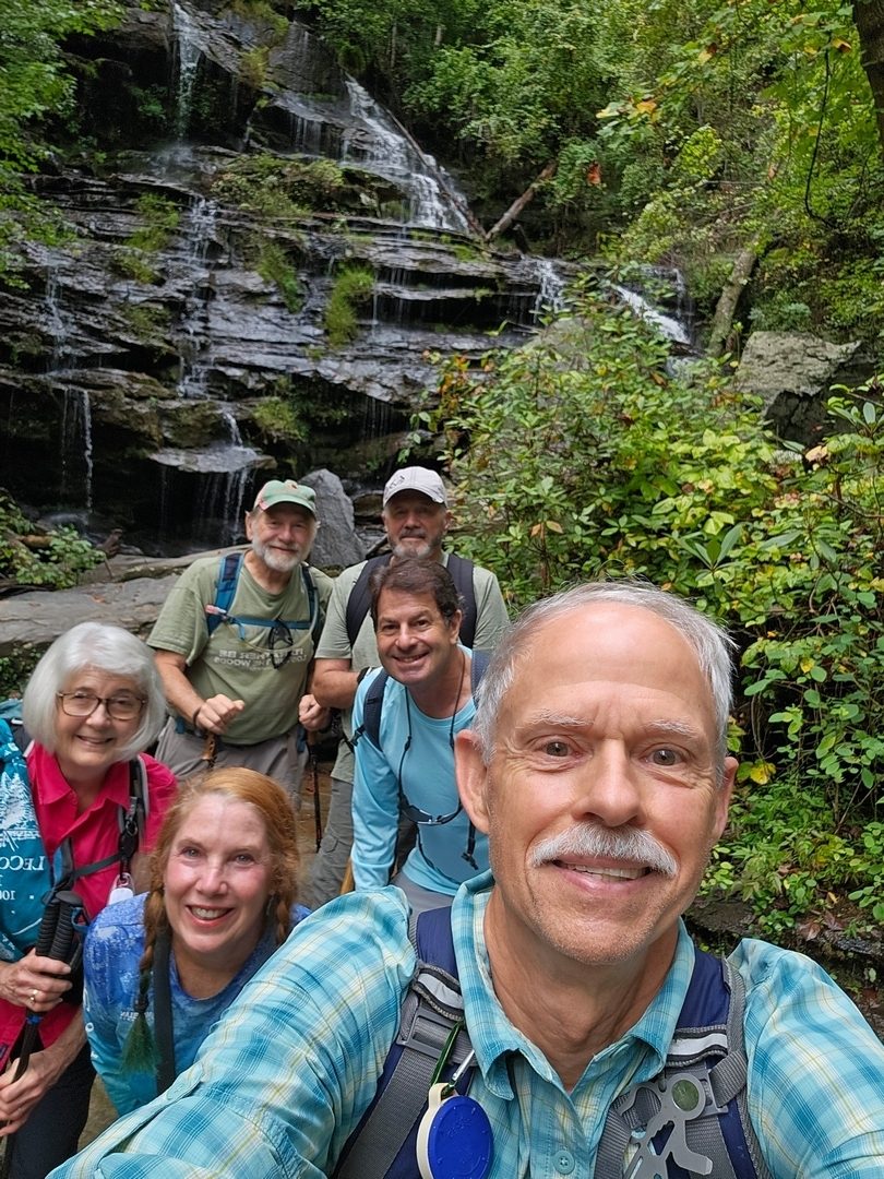 The "to the bottom of the falls" hikers today.  Someone should teach me a better way to take a group selfie.