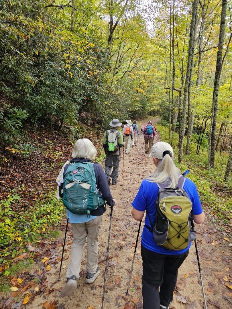 The initial trail is a gravel road descending to Panthertown Valley.