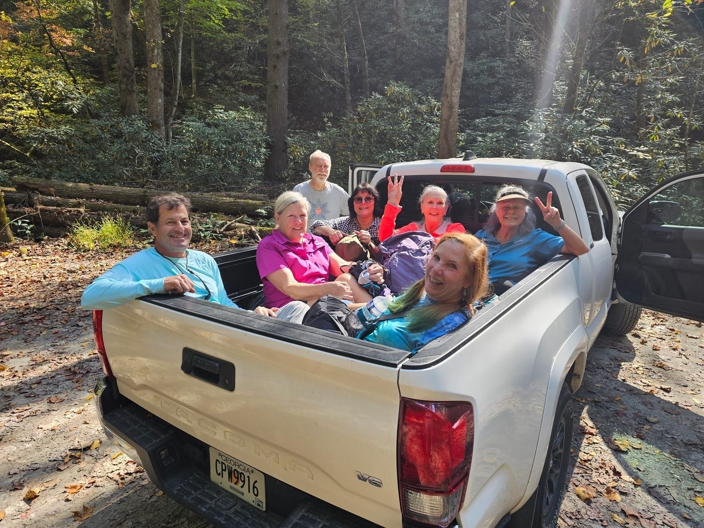 A cheery group as we shuttle back to the trailhead. Thanks everyone.