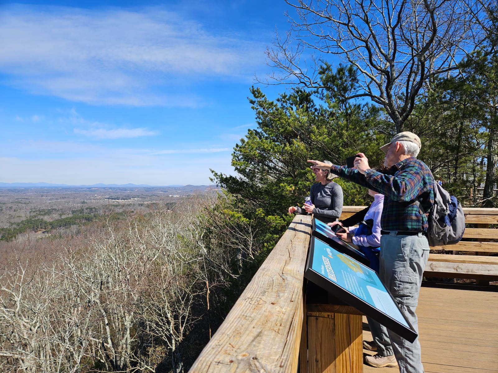 Trying to figure out the mountain peaks we see in the distance.  Photo by Sue Vaughn
