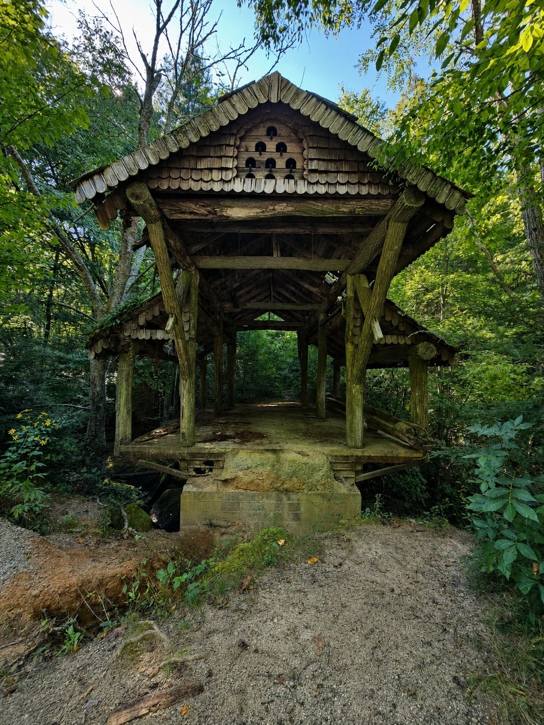 We also pass by the covered bridge built by a developer as an entrance, but the connection to the highway was nixed by GA DOT.  Now abandoned.