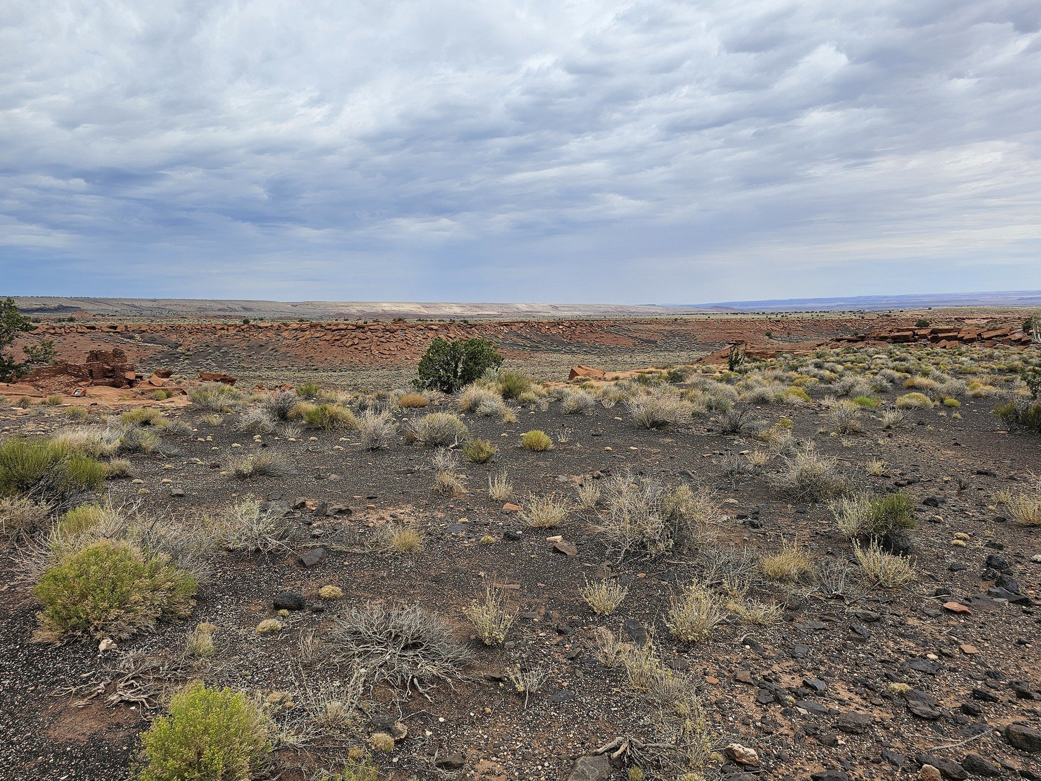 A view of the surrounding terrain. You can see the volcanic rocks. Pretty arid now.