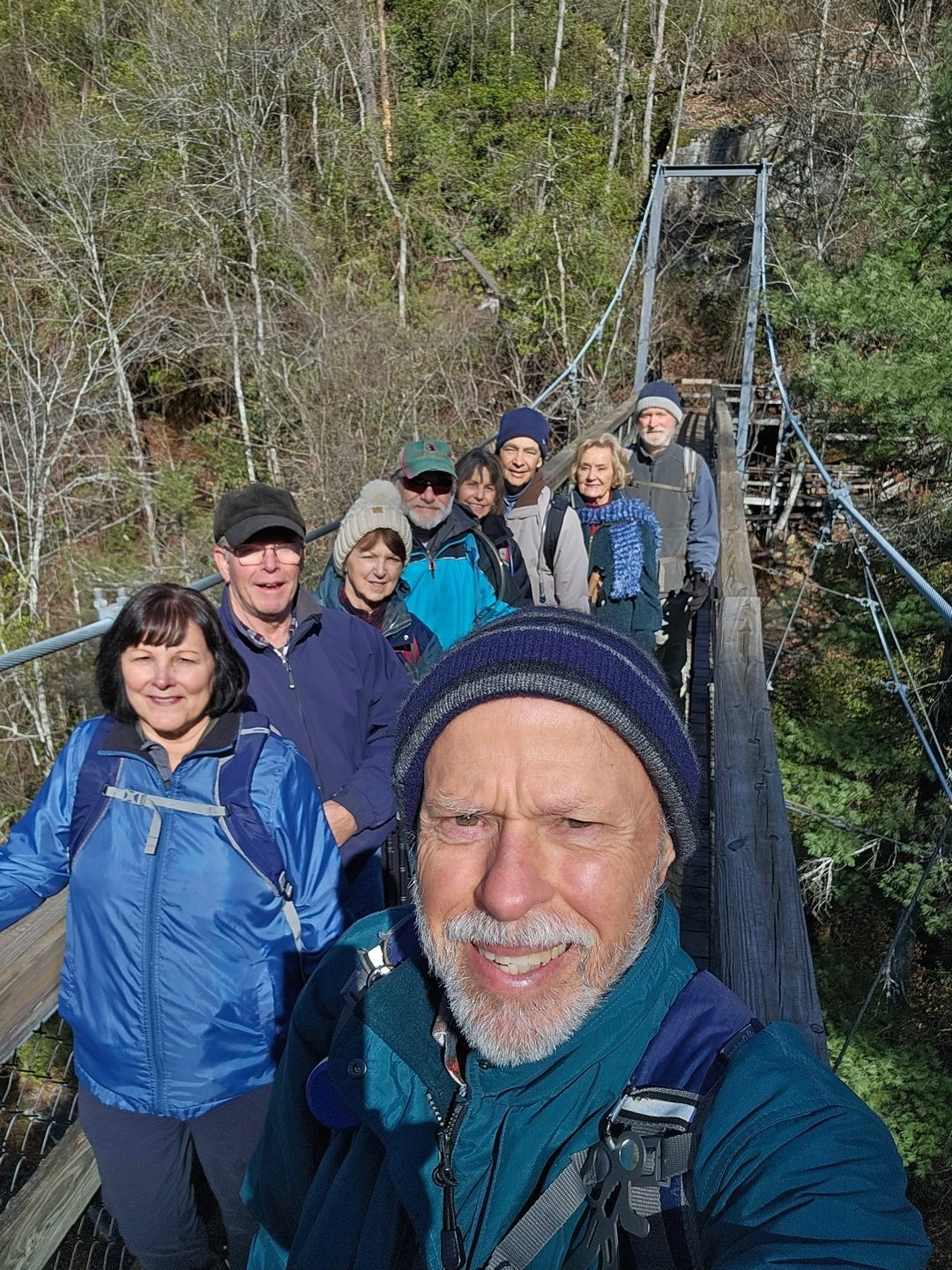 Our hikers who ventured down to cross on the suspension bridge (front to back): Mike, Lynn, Eric, Jenny, Jack, Beth H, Charles, Beth McD & Matt.