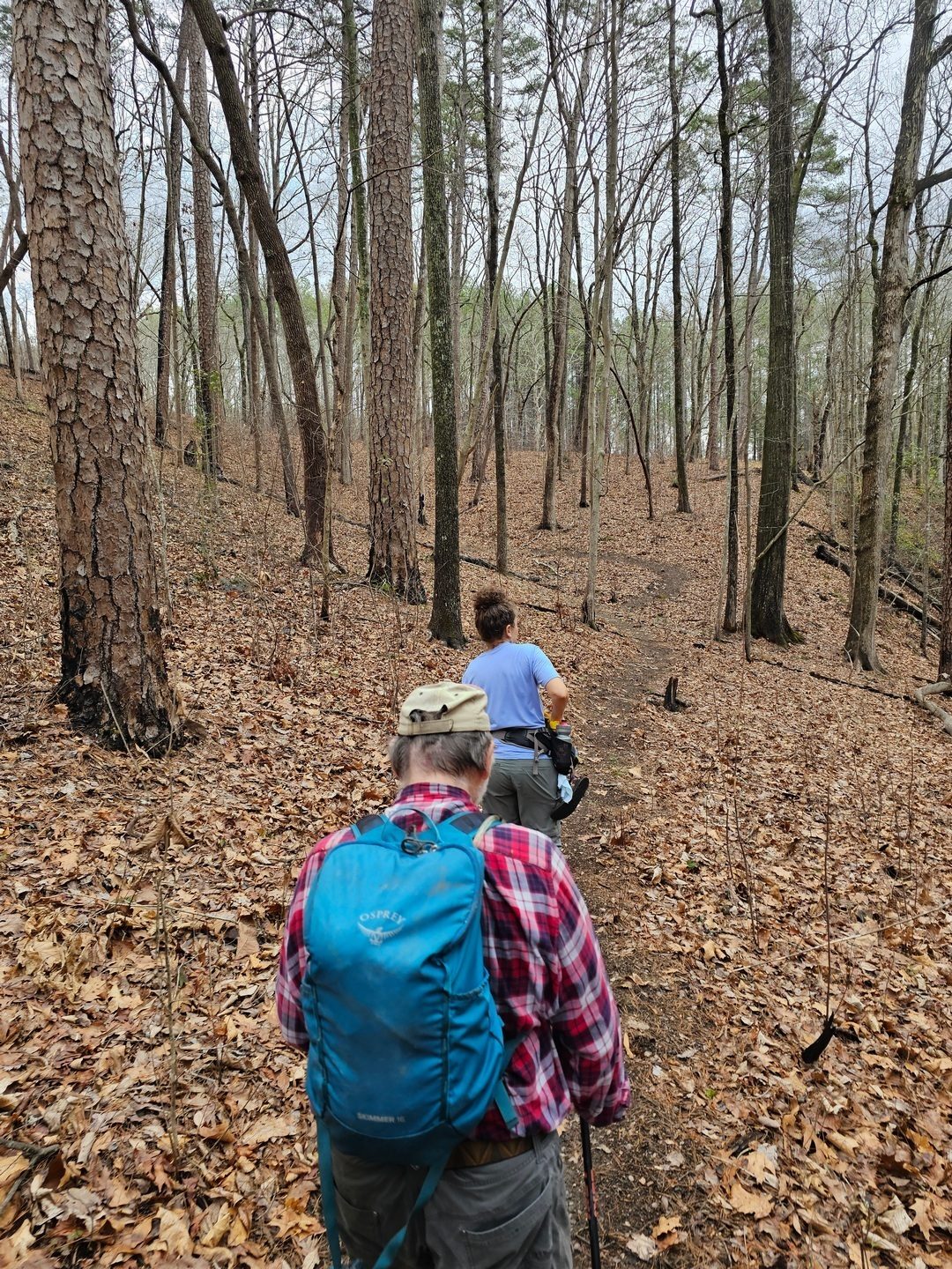 Headed back to the trailhead on a very nice mountain bike path with switchbacks no less. A bit tiring, but rewarding hike. Good job Jack and Heather!.